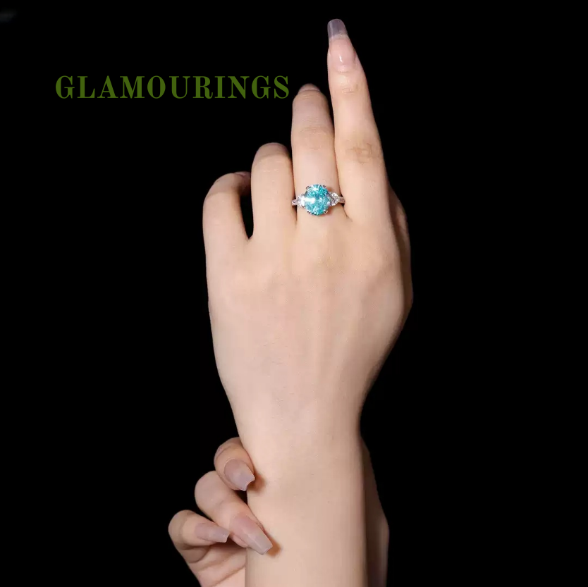 GLAMOURINGS Fancy Vivid Blue Diamond Three-Stone Ring